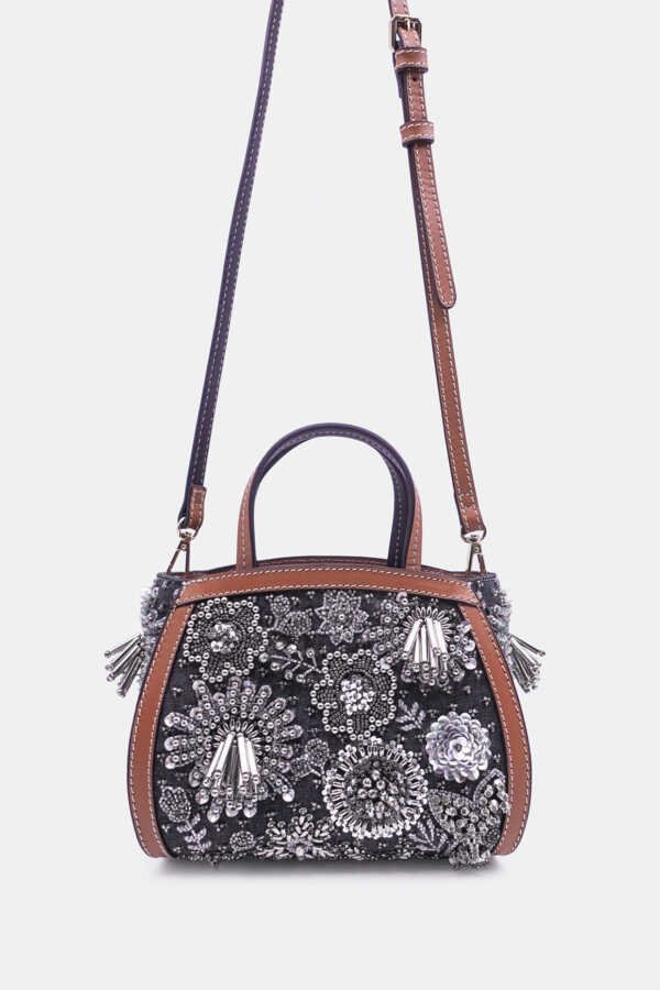 Handcrafted silver crossbody clutch with bead embellishment and tan leather trims