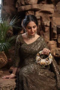 Golden Mirage Mini Beaded Bag with floral embroidery and tassels