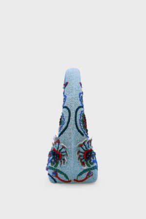 Side view of sculptural Ocean Crest Beaded Shoulder Bag