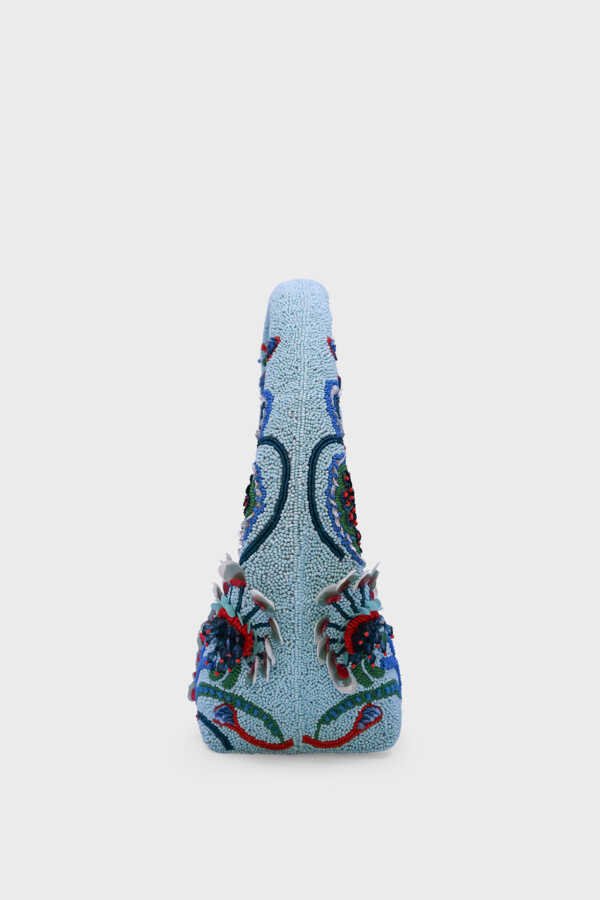 Side view of sculptural Ocean Crest Beaded Shoulder Bag
