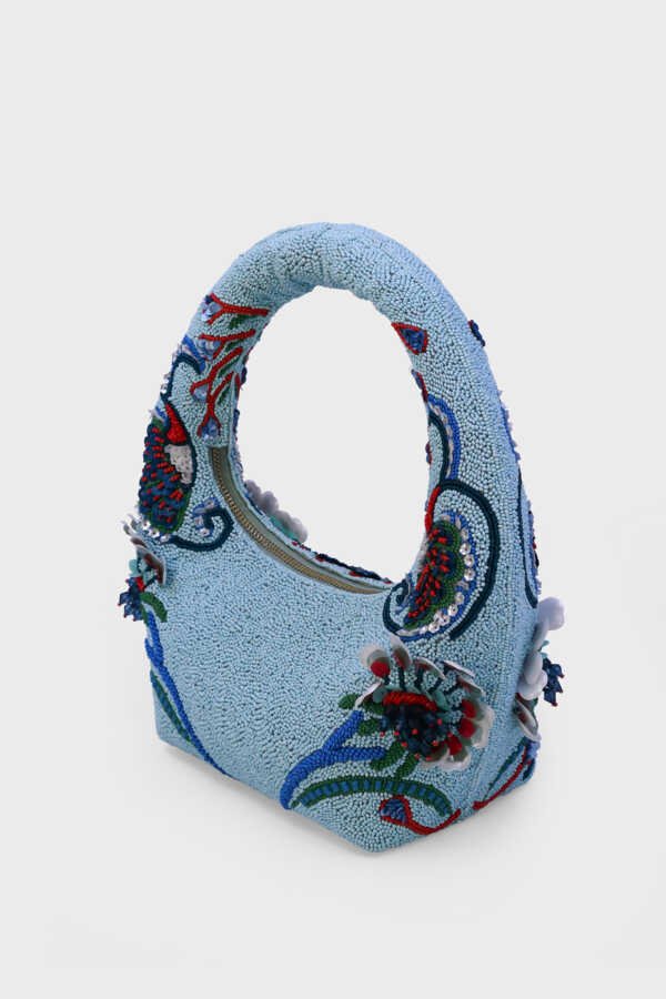 Luxury evening beaded bag inspired by ocean waves