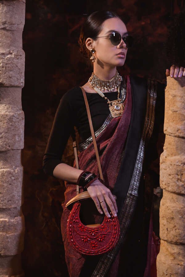 The New Moon maroon embellished mini crossbody bag with Moroccan-inspired bead and stone design