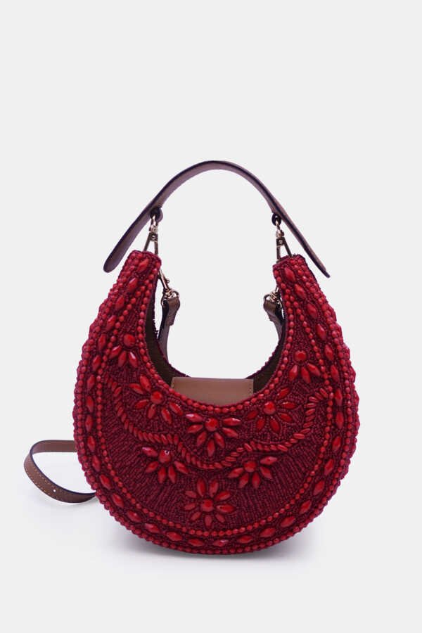 Designer maroon embellished bag styled with cocktail evening outfit