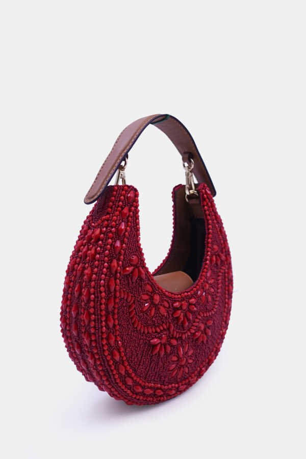 Structured maroon mini bag with beadwork and pale gold hardware by Versuhz
