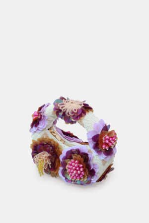 Amethyste Bloom Violet Pearl Mini Bag with handcrafted floral embellishments, pearl detailing, sequins, violet bead embroidery, and a pearl-white luxury finish.