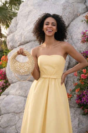 Moonlace Mini Embellished Bag in cream with handcrafted lace-inspired bead embroidery, structured silhouette, and elegant sculptural top handle.