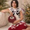 Rubi Royale Mini Embellished Bag with handcrafted ruby-red bead embroidery, crystal embellishments, sculptural top handle, and detachable gold chain.